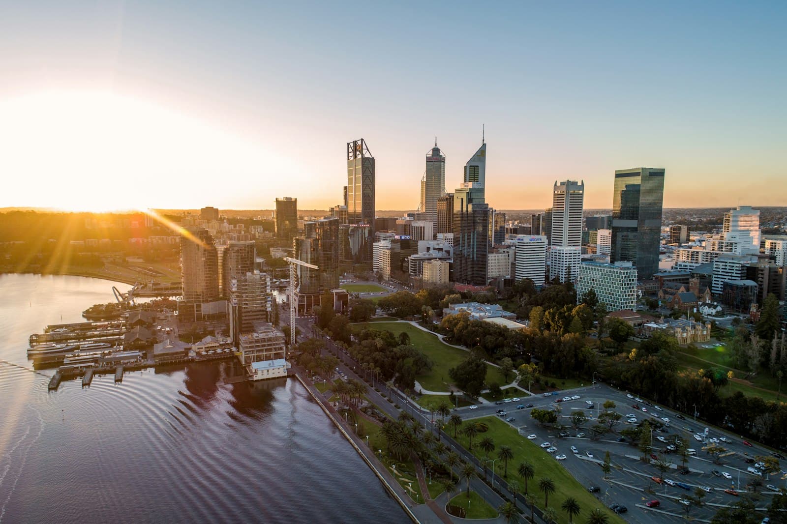 Perth city skyline across the Swan River at dusk